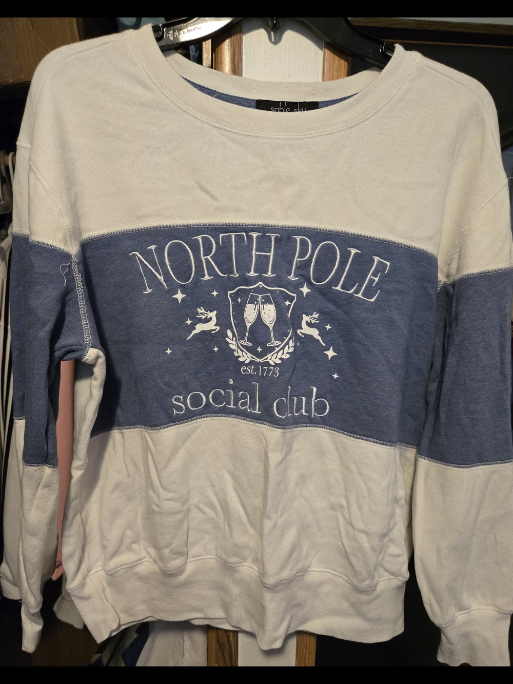 Sable And Sky North Pole Social Club Women's White and Blue Crewneck Sweatshirt
